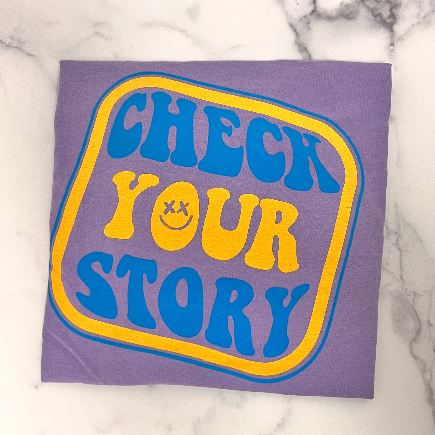 Check Your Story Tee